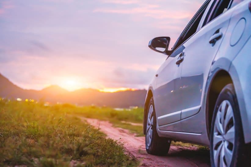 car with sunset background